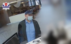 zdjecie przedstawia wizerunek oszusta