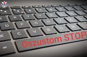 na zdjęciu klawiatura i czerwony napis stop oszustom