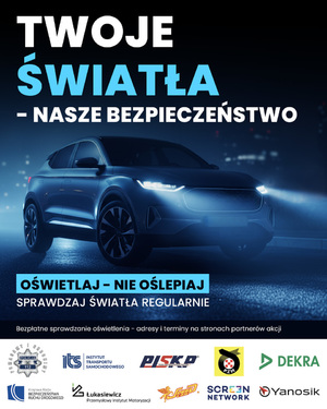 samochód z włączonymi swiatłami